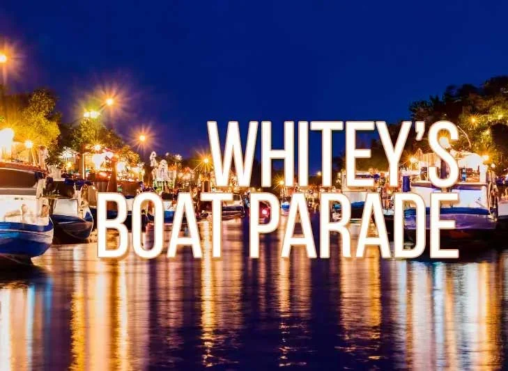 Lighted boats with event name printed.