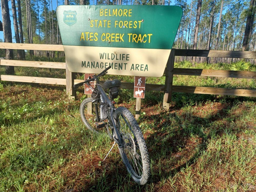 Belmore State Forest Sign with bike in front
